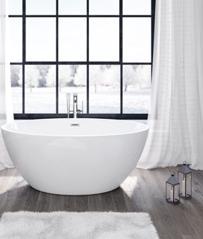 Freestanding Bathtub in front of a large window